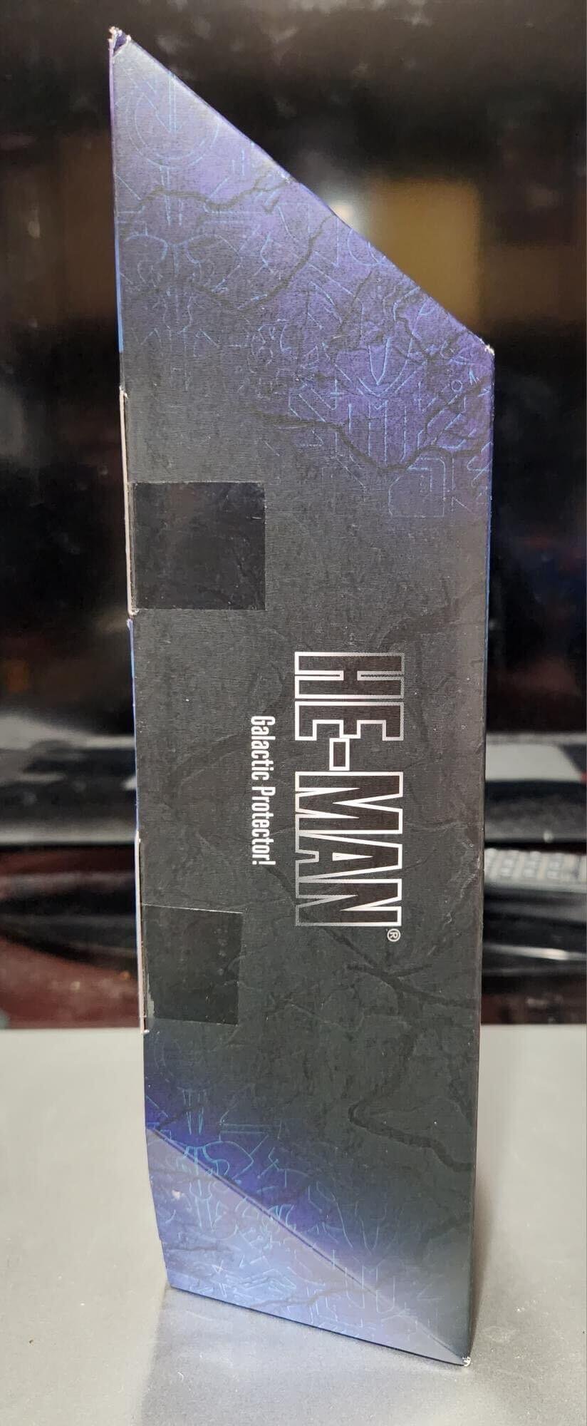 Masterverse Galactic Protector He Man Package left in hand