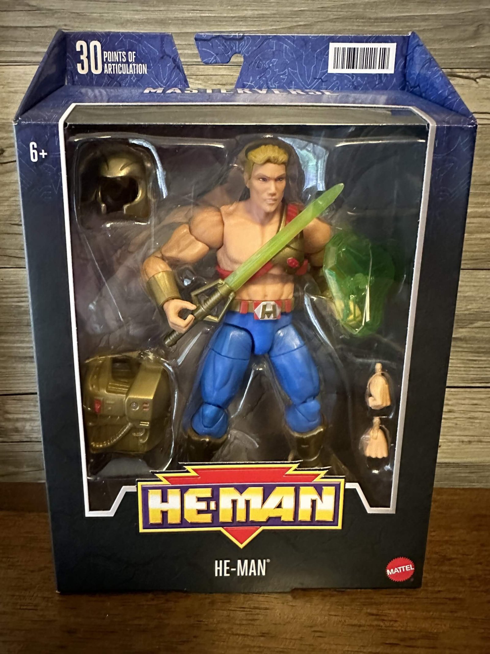 Masterverse Galactic Protector He-Man TS in hand front of package 1