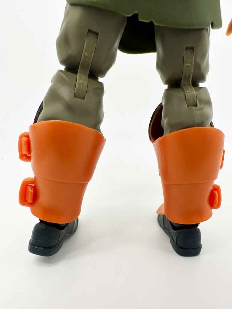 Masters-of-the-Universe-Man-At-Arms-Revelation-Deluxe-armed-up-legs-rear