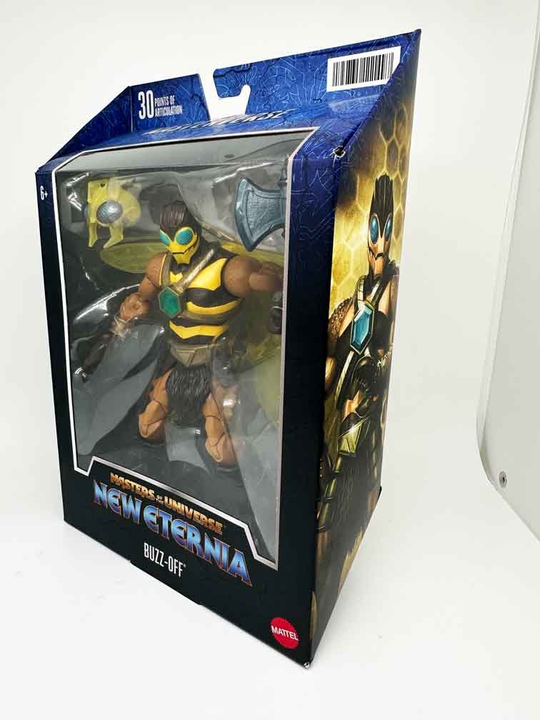 Masterverse-New-Eternia-Buzz-Off-Package-front-angle-in-hand