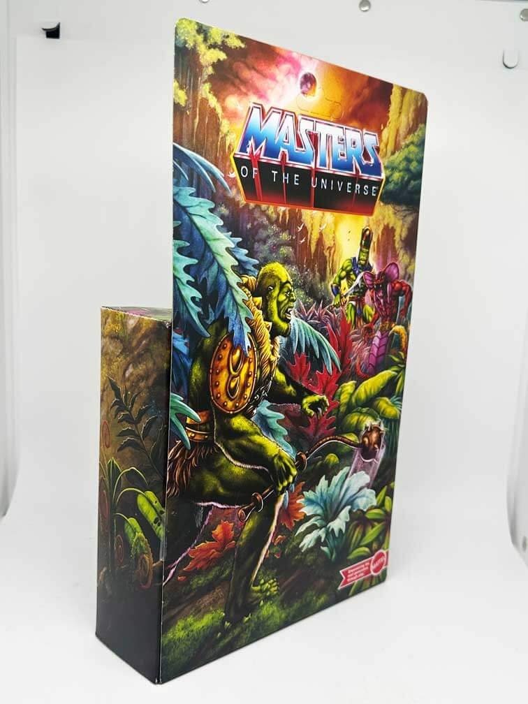 MOTU-Origins-Moss-Man-Package-angle-rear-left-in-hand