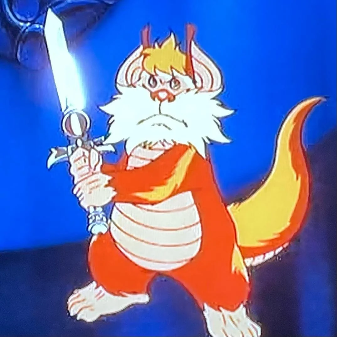 Snarf Holding Sword of Omens Tnundercats Cartoon