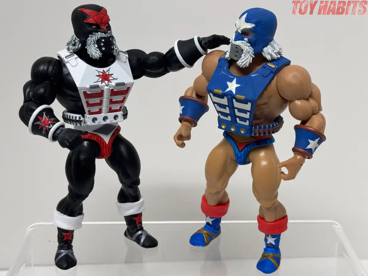 Both figures wear their masked heads, giving us a great look at the differences between the two designs.