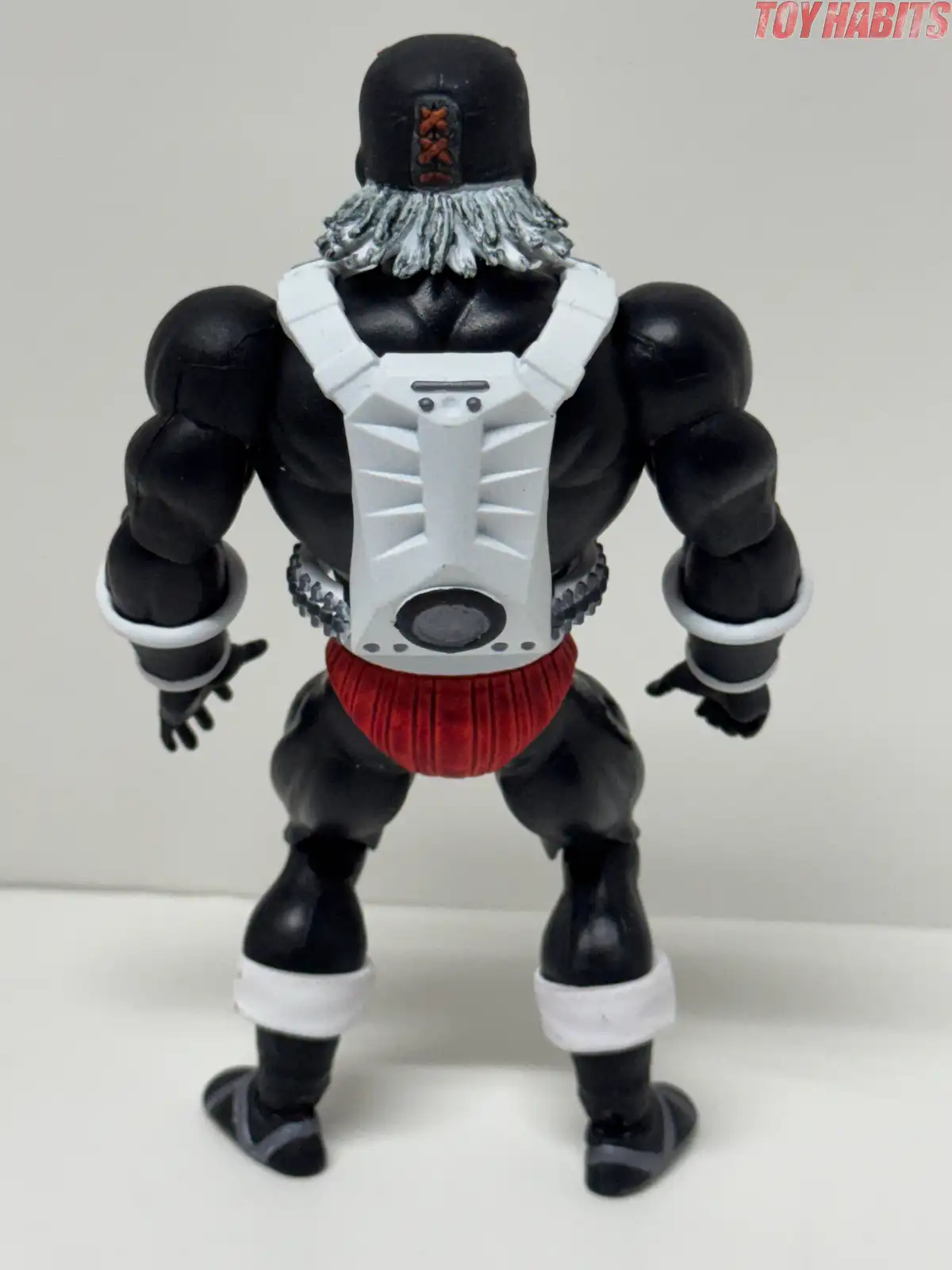 The rear view reveals the white armor's sculpted mechanical panels and circular silver-gray detail.