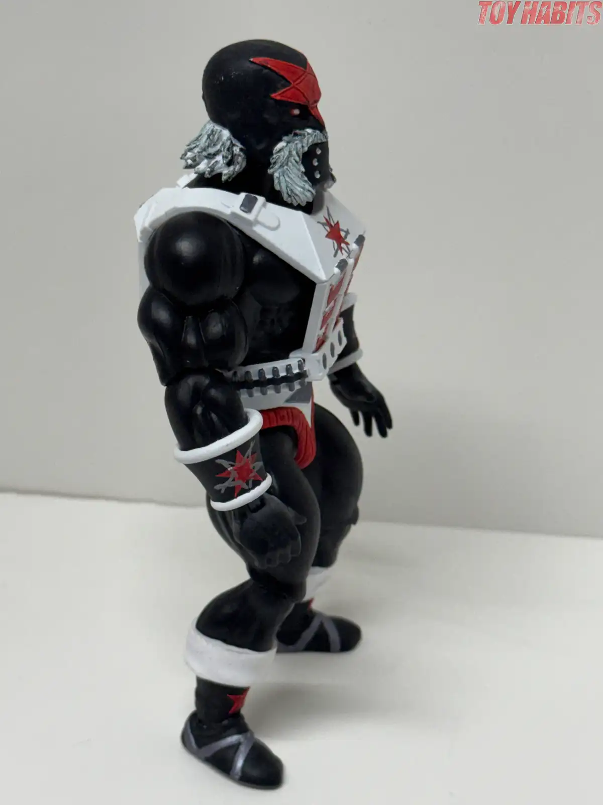 The side profile shows the thickness of the white chest armor and the sculpted mechanical details around the waist.
