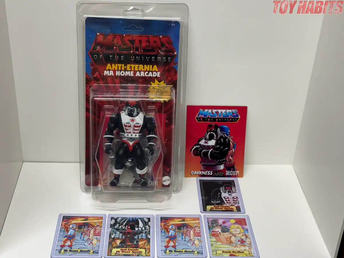 The complete release is presented with the carded figure inside its protective case, the Darkness and Deceit mini comic, and the included collector cards.