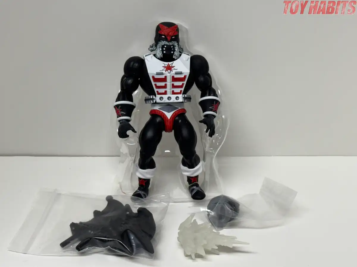 The figure is secured in a molded clear plastic tray, with the weapons and blast effect packaged together in a separate protective bag.