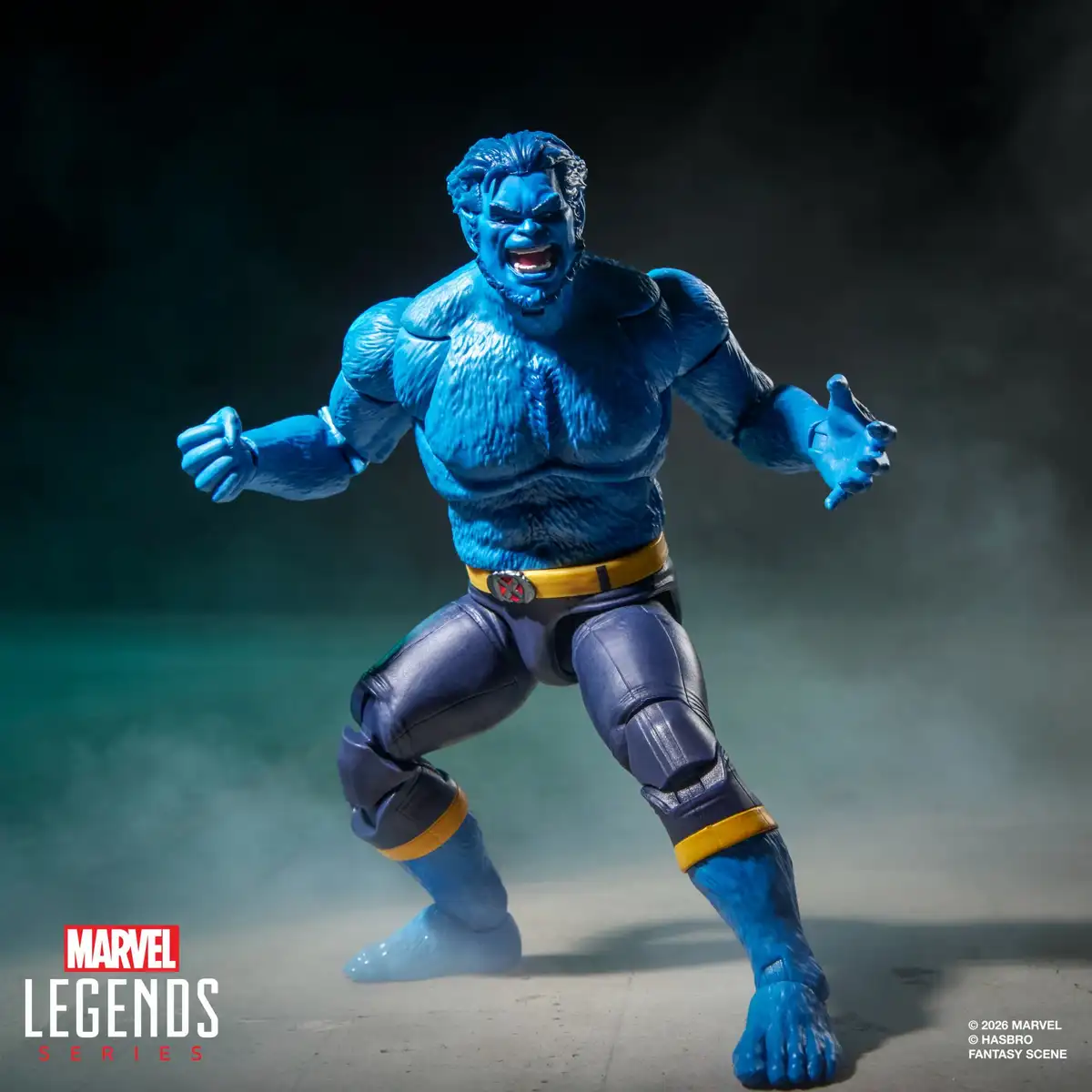 Beast features bright blue sculpted fur, an open-mouthed expression, dark blue pants, and a yellow belt with an X-Men emblem.