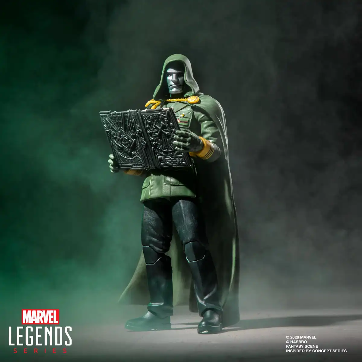 Lord Doom holds an ornate closed book with raised sculpted symbols and decorative detailing.