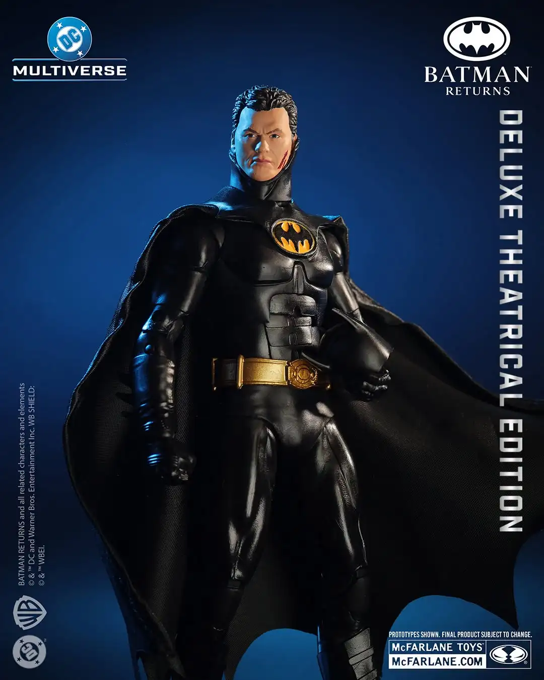 Unmasked Michael Keaton Batman figure with facial scratches, black armor, gold utility belt and cape holding cowl