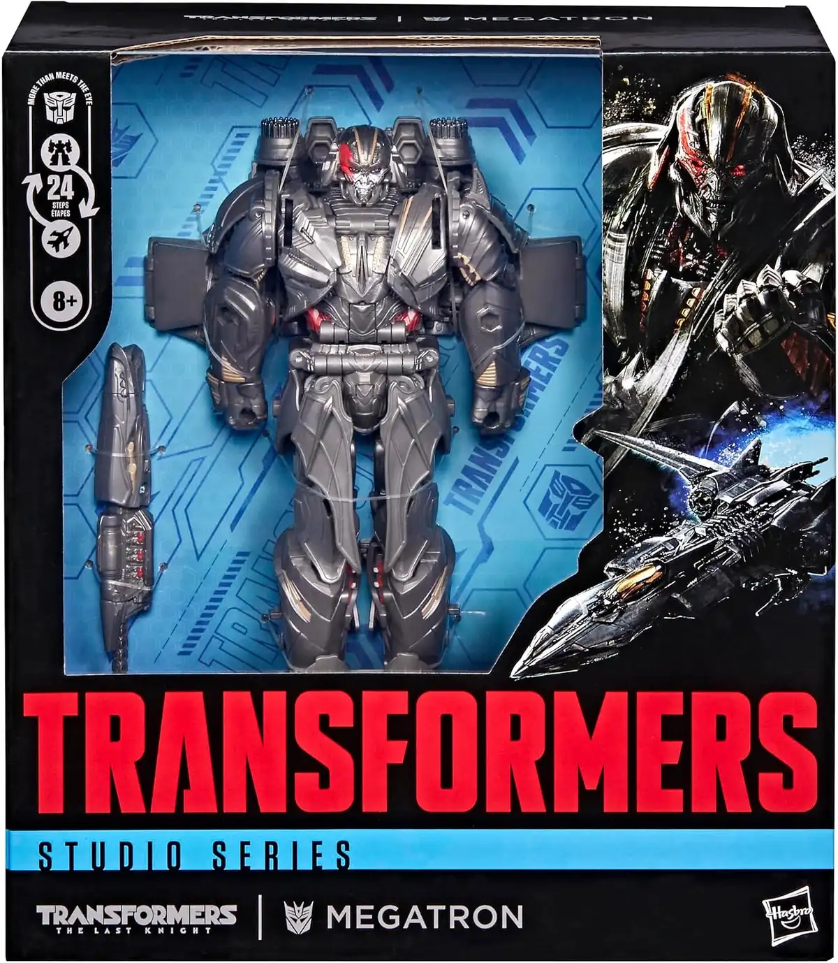 The front of Megatron’s box displays the figure through the window with a separate accessory alongside it, plus artwork of Megatron and his jet mode.