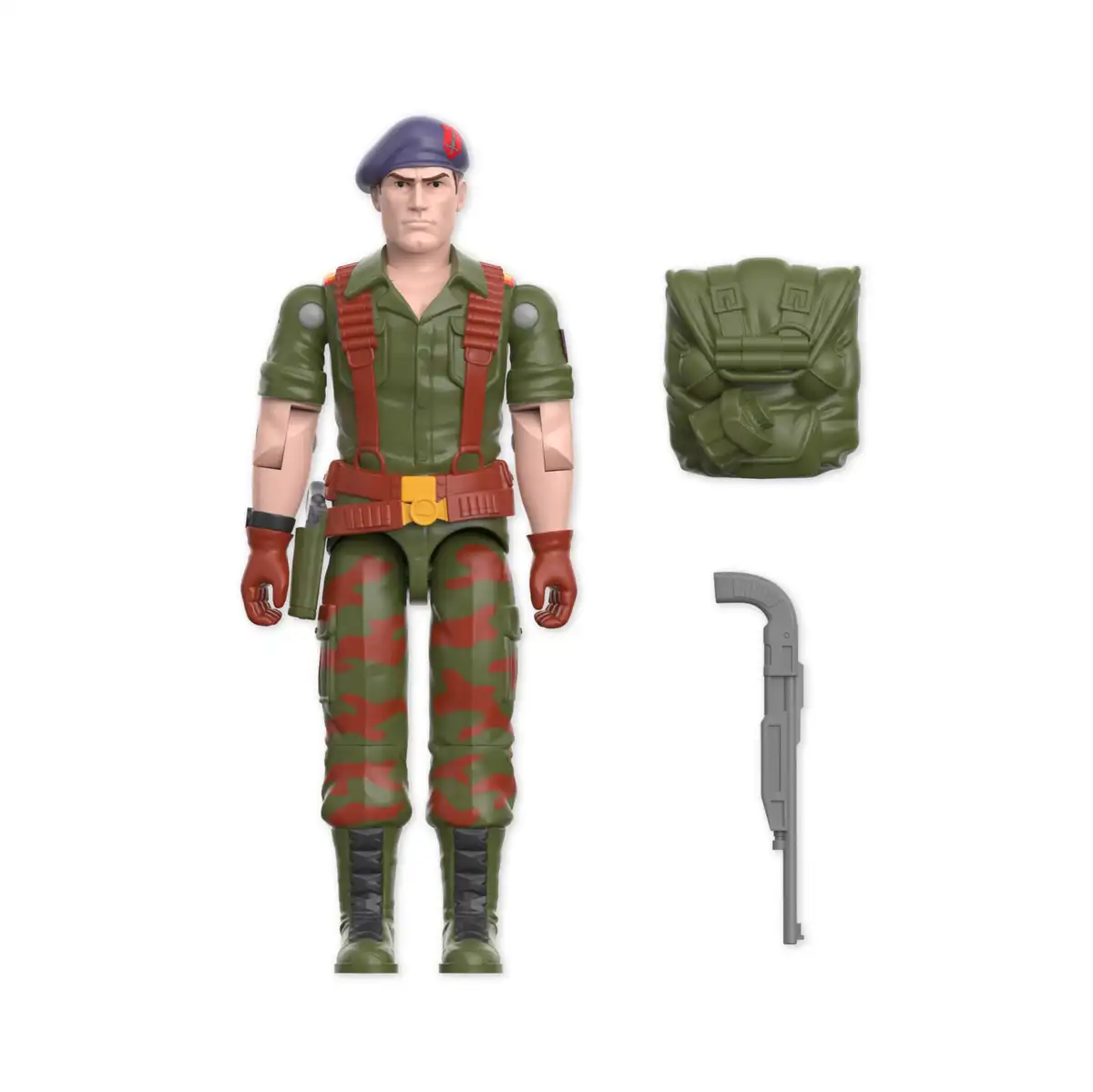 Flint is shown with his purple beret, green shirt, brown vest, and camouflage trousers.